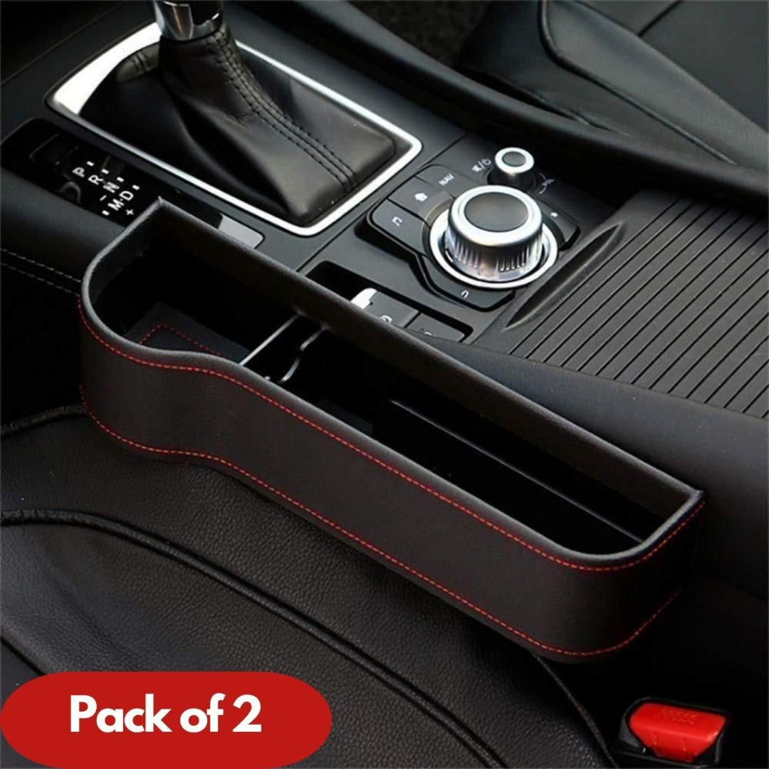 Car console organizer with red stitching on a car dashboard, labeled 'Pack of 2'.